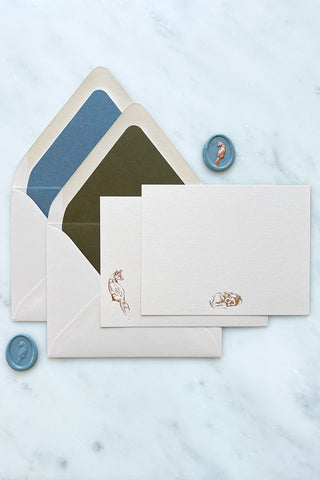 Photo of a set of correspondence cards featuring foil stamped fox designs and lined envelopes by equine artist Danielle Demers
