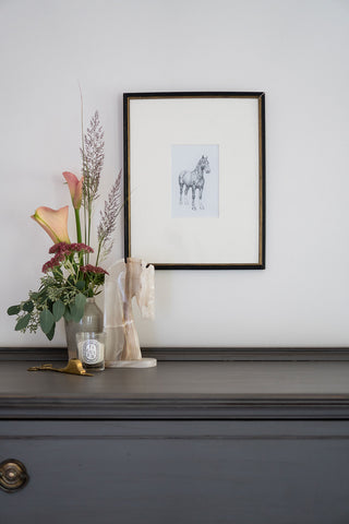 Photo of a framed original graphite drawing of a horse entitled The Proud Parade Pony by equine artist Danielle Demers