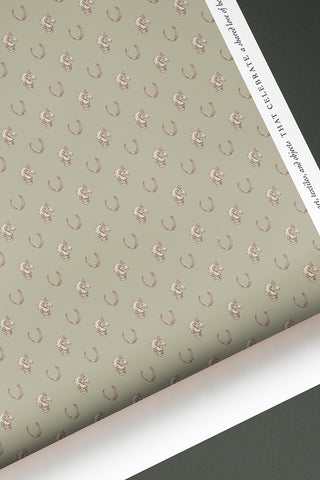 Roll of Heirloom & Heritage wallpaper in the colorway "Green Clay." Designed by equine artist Danielle Demers.