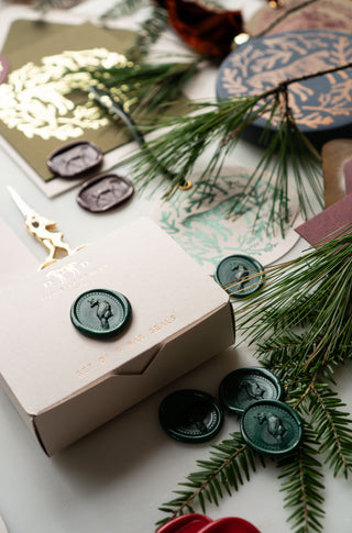 The holiday collection by Danielle Demers Studio featuring equestrian wax seals, gift tags, ornaments and greeting cards.