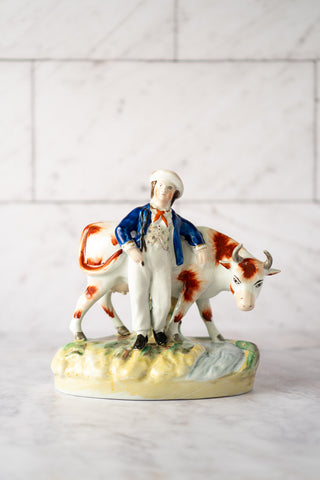 Pastoral English Staffordshire Figure with Cow, 1835-1875