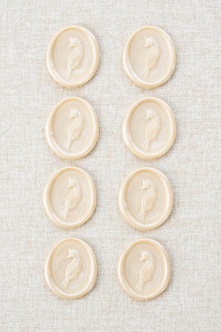 Set of eight metallic cream fox motif wax seals