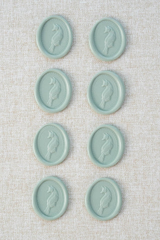 Set of eight metallic duck egg green motif wax seals