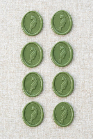 Set of eight sap green fox motif wax seals