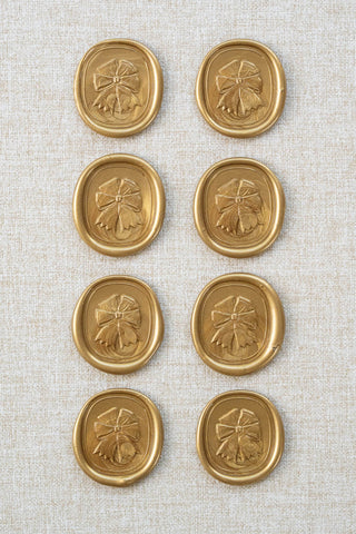 Set of eight metallic gold equestrian rosette motif wax seals