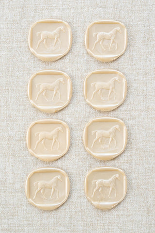 Set of eight metallic off white cream walking horse motif wax seals