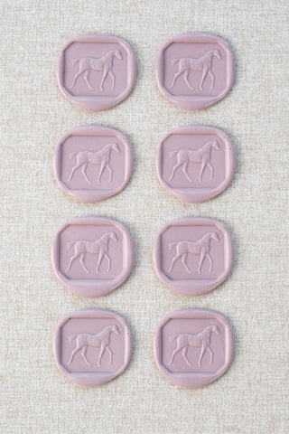 Set of eight mauve walking horse motif wax seals