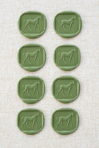 Set of eight sap green walking horse motif wax seals