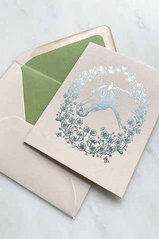 Silver Blue metallic foil stamped note card, featuring a drawing of a horse in a wreath of cosmos flowers, bees and butterflies, on cream 111lb card stock by equine artist Danielle Demers.