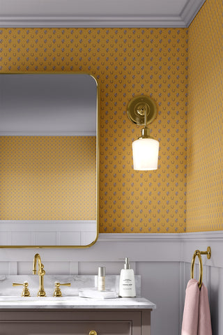 Interior bathroom scene featuring Heirloom & Heritage wallpaper in the colorway "Gamboge Yellow." Designed by equine artist Danielle Demers.